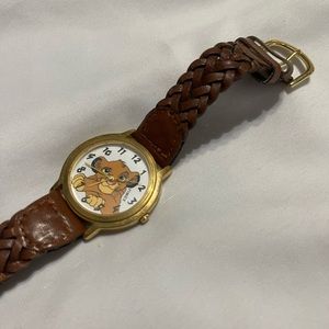 Vintage 90’s Timex Disney The Lion King watch with braided leather band